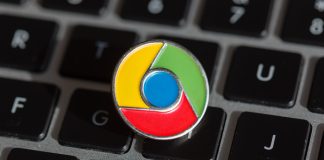 5 Google Chrome Extension Yang Perlu Guru Guna Google Chrome logo pin on a laptop keyboard