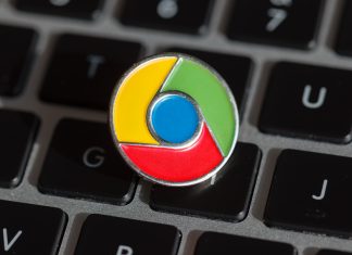 5 Google Chrome Extension Yang Perlu Guru Guna Google Chrome logo pin on a laptop keyboard