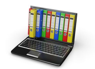 Cara Untuk Kompres dan Zip Fail atau Dokumen Laptop with colorful ring binders; file compression and zipping.