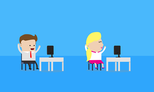Happy businesspeople working at computers, ready to use WhatsApp and Telegram on their computers.