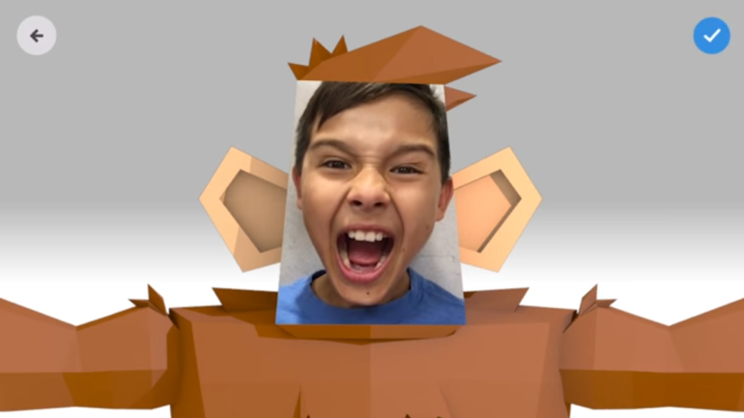 Boy's face in Toontastic 3D monkey costume, creating a fun story.