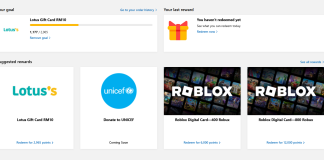 Robux Roblox Percuma dan Baucar Lotus Percuma dengan Microsoft Bing Rewards interface showing free Robux and Lotus gift cards. Earn points to redeem.