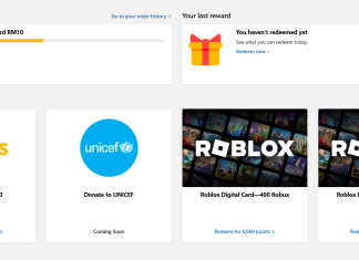 Robux Roblox Percuma dan Baucar Lotus Percuma dengan Microsoft Bing Rewards interface showing free Robux and Lotus gift cards. Earn points to redeem.